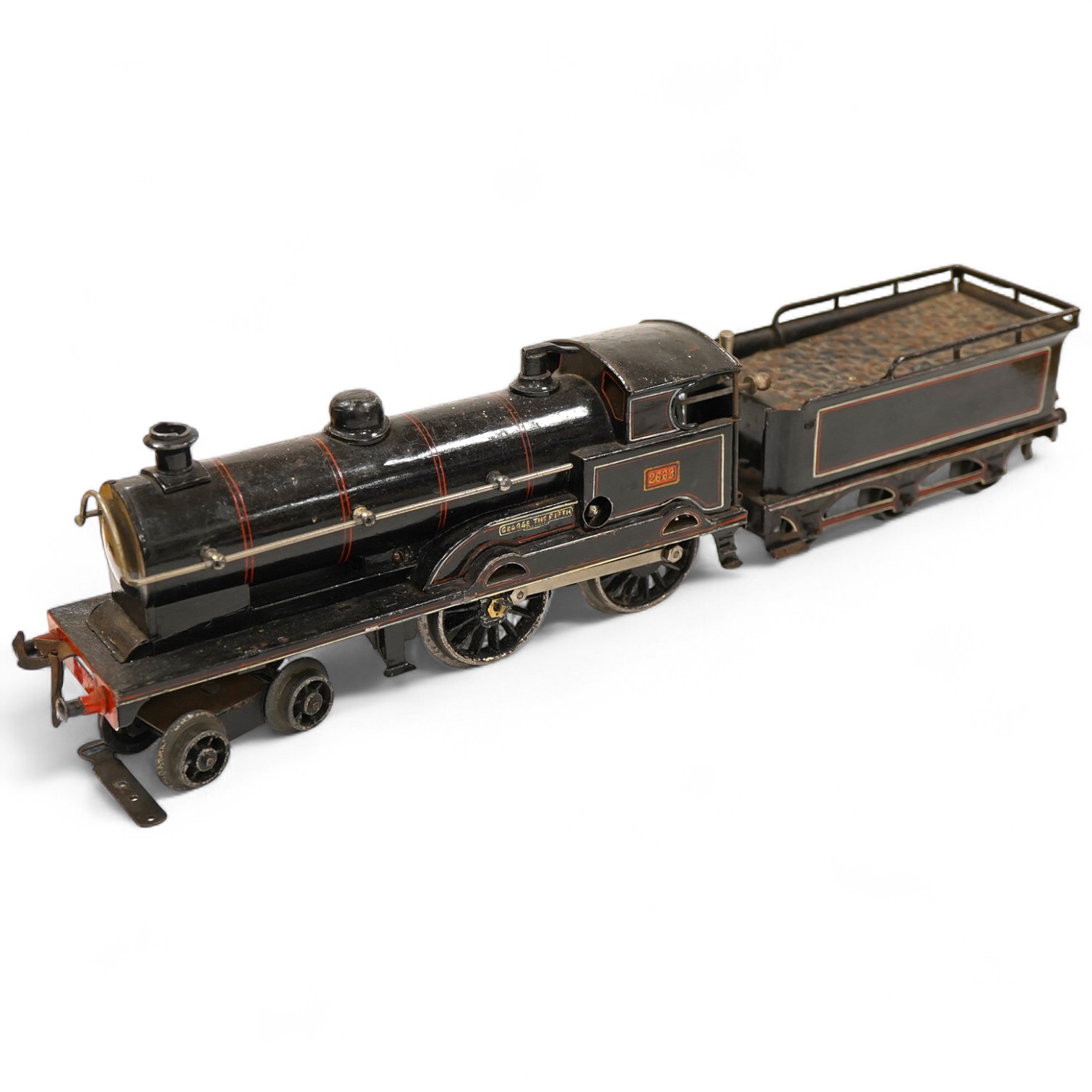 An 0 gauge Bing for Bassett-Lowke tinplate clockwork LNWR 4-4-0 tender locomotive, George the Fifth 2663, in red lined black livery with original clockwork mechanism